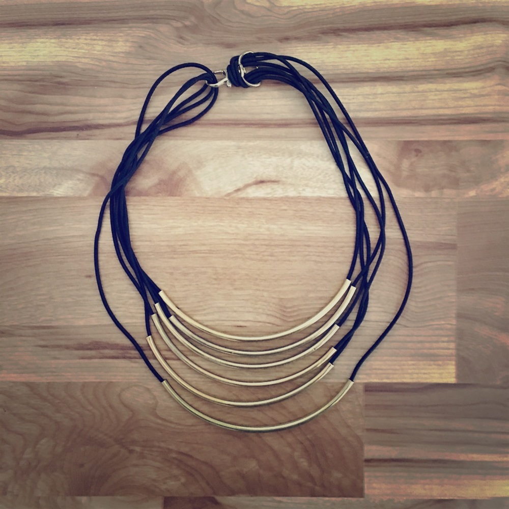 Layered black and gold necklace